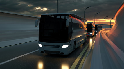 A convoy of three white buses drive on a highway at sunset backlit by a bright orange sunburst under an ominous cloudy sky. 3d Rendering