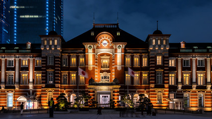 Fototapeta na wymiar Tokyo Station at night,is a railway station in Chiyoda-ku, Tokyo, Japan. The original station is located in Chiyoda's Marunouchi business district .