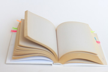 open book with blank empty white pages on white background
