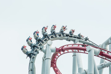 people enjoy Roller coaster on sky background view