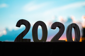  2020 Happy New Year of wooden number with sky and cloud twilight beautiful nature. celebration