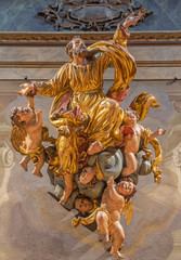 Fototapeta na wymiar COMO, ITALY - MAY 8, 2015: The carved baroque sculptural group Glory of Saint Peter Celestine in church Santuario del Santissimo Crocifisso by unknown artist (17. cent).
