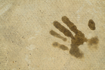 A handprint on dirty floor