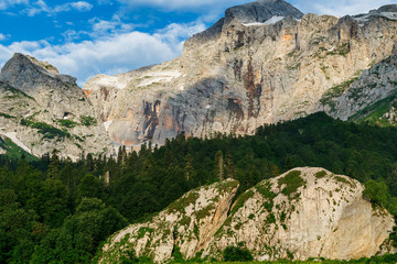 Gray high rocky mountain located. Caucasian reserve, mountain Fisht