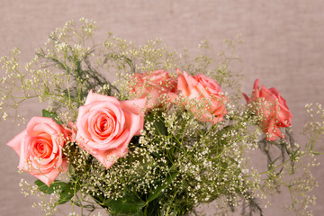 Background with a bouquet of beautiful roses for congratulations