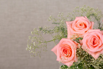 Background with a bouquet of beautiful roses for congratulations