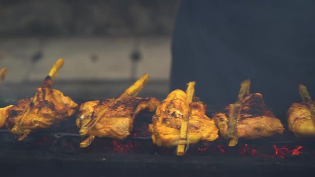 Popular Malaysia cuisine called ayam percik sold at market stalls during Ramadan for iftar.