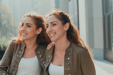 Two twins sisters spending time together
