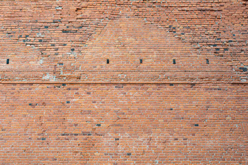 Old damaged worn brick wall background