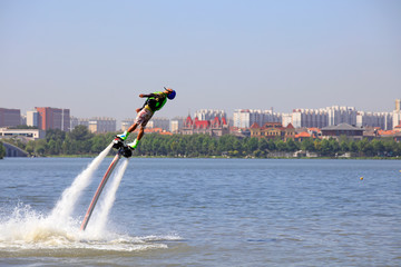 Water stunts performance in a park