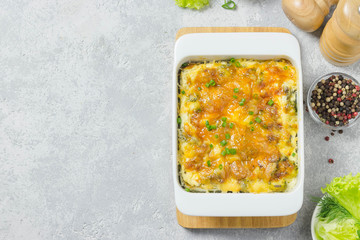 Cheesy chicken cabbage casserole. Top view, space for text.