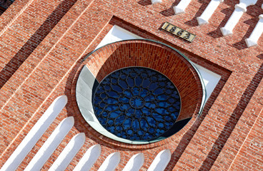 A round church window. Image tilted