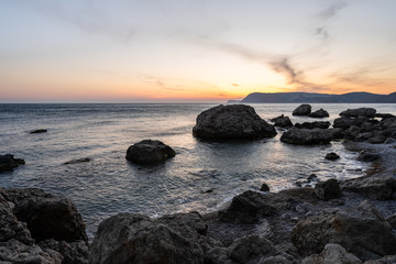 Fototapeta na wymiar Sunset on the Black Sea with the sun. Georgia, Abkhazia.