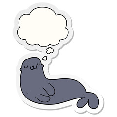 cute cartoon seal and thought bubble as a printed sticker