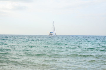 Sailboat in the middle of the sea Phuket Thailand