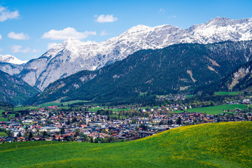 Fototapeta na wymiar Panoramic view from the hill next to Saalfelden and RItzen lake, Austrian alps.