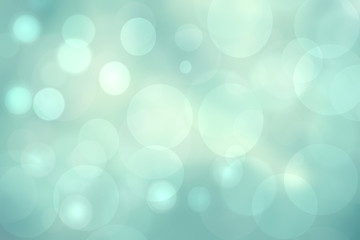Abstract gradient turquoise light blue shiny blurred background texture with circular bokeh lights. Beautiful backdrop. Space for design.
