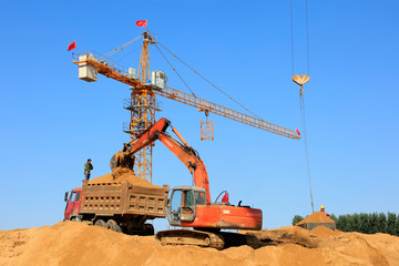 Excavators and cranes on construction sites, China