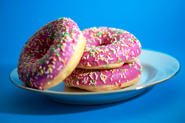donut with frosting on a plate