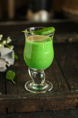 Smoothies, banana, avocado, chia seeds and more are healthy food concept. food background. top view