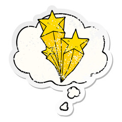 cartoon shooting stars and thought bubble as a distressed worn sticker