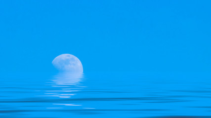 Moon over the blue wide sea