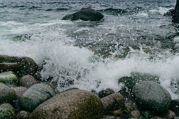 Barents Sea cold water beating against the rocky shore