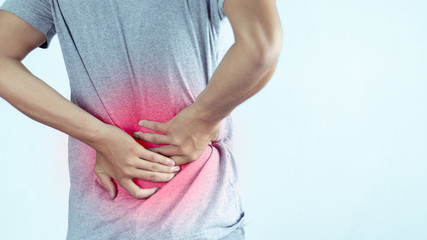 man suffering from backache,Lower back pain.