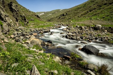 Cascades on a creek in the mountains. A stunning spring mountain landscape. Mount Aragats. Armenia