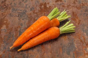 Three Young fresh ripe carrot