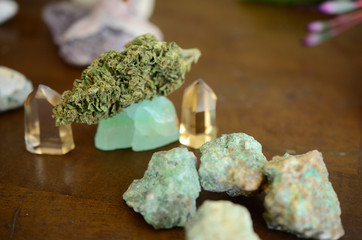 Cannabis and Crystals. Marijuana flower with healing crystal assortment. Citrine crystals. Medical...