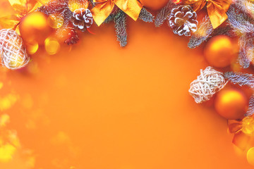 Christmas composition.  Background  orange colors with decorations. 