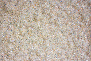 Sea sand from the beach (top view).