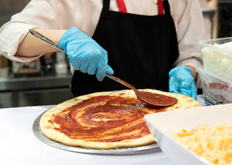 Chef preparing pizza, Chef process of making pizza in pizza restaurant