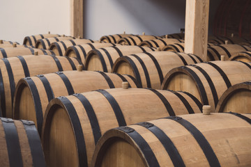 Oak barrels in the cellar filled with brandy