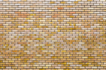 Old brick wall, old texture of orange blocks closeup