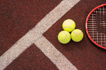 Top view of sports gear for game of tennis on stadium