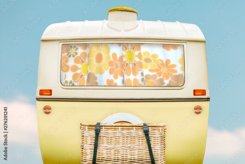 Wall mural vintage caravan in two tone yellow and white