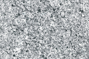 Fototapeta na wymiar Mottled surface of granite.