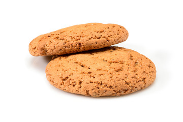 Homemade cookies. Two sweet cookie made from oatmeal flour. Tasty biscuit in high resolution closeup isolated on white background. Homemade bakery.