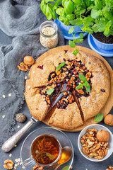 Green tea and Galette pie with black currants.