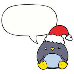 cute cartoon penguin wearing christmas hat and speech bubble