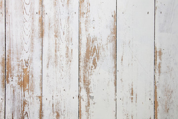 White wooden floorboards. Distressed worn floorboard background painted white
