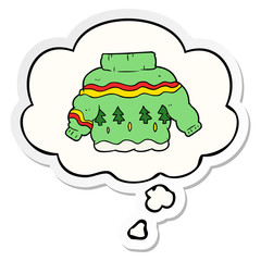 cartoon christmas jumper and thought bubble as a printed sticker