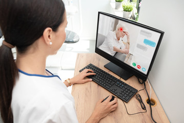 Doctor and senior woman patient, telehealth