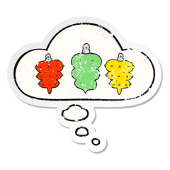 cartoon christmas decorations and thought bubble as a distressed worn sticker