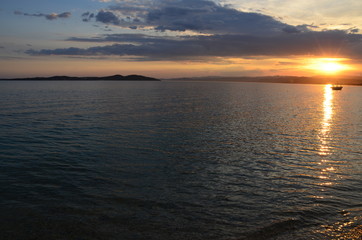Obraz premium Sunset over the sea