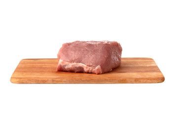 A piece of meat on a white background. Raw piece of pork on a wooden board.