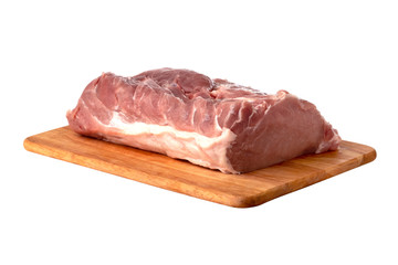 A piece of meat on a white background. Raw piece of pork on a wooden board.