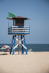 Watchtower at Chipiona beach frontline and blue sky